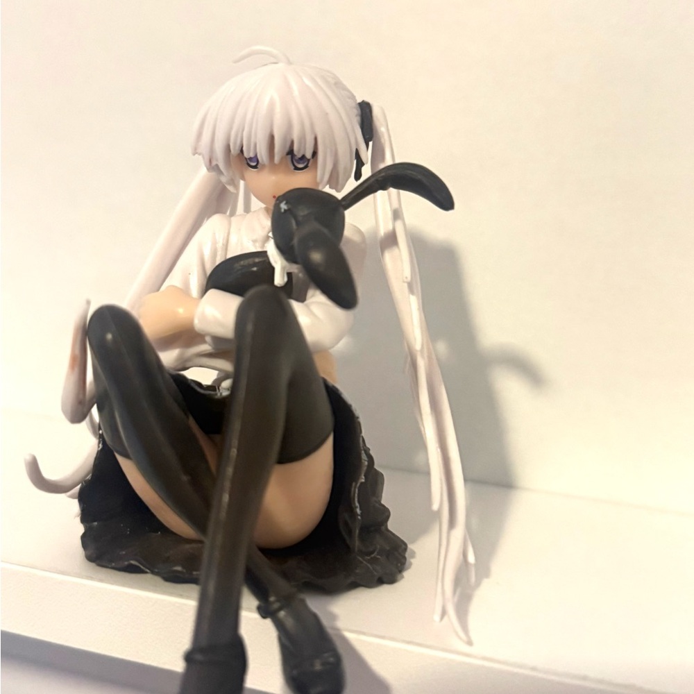 Anime Character Figurine with Black and White Accents